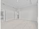 Spacious bedroom boasts neutral carpet, recessed lighting, and entrances to bathroom and kitchen at 3528 Golden Wheat Ln, Plant City, FL 33565