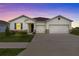 Charming single-Gathering home featuring a two-car garage and well-manicured lawn at 3528 Golden Wheat Ln, Plant City, FL 33565