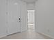 Bright, airy foyer with tile flooring and an open doorway view at 3528 Golden Wheat Ln, Plant City, FL 33565