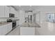 Bright kitchen featuring granite countertops, stainless appliances, and an island at 3528 Golden Wheat Ln, Plant City, FL 33565