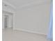 Bright living room showcasing tile flooring and ample natural light at 3528 Golden Wheat Ln, Plant City, FL 33565