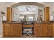 Luxurious bathroom featuring dual sinks, vanity space, granite counters, and recessed lighting, offering a blend of style and function at 3668 Janus Way, Palm Harbor, FL 34685