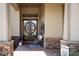 Beautiful double front doors with decorative wreaths and welcoming decor at 3668 Janus Way, Palm Harbor, FL 34685
