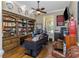 Well-appointed office space with custom built-ins, hardwood floors, and ample natural light at 3668 Janus Way, Palm Harbor, FL 34685