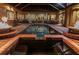 Outdoor pool and spa with decorative planters and an outdoor dining area at 3668 Janus Way, Palm Harbor, FL 34685