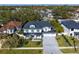 Beautiful two-story home featuring a spacious driveway, manicured lawn, and lovely landscaping at 3815 W Obispo St, Tampa, FL 33629
