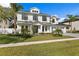 Attractive two-story home featuring well-kept landscaping, and a three-car garage at 3815 W Obispo St, Tampa, FL 33629