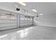 Spacious three car garage with modern epoxy floor at 3815 W Obispo St, Tampa, FL 33629