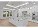 Gourmet kitchen featuring an island, granite countertops, pendant lights, and stainless steel appliances at 3815 W Obispo St, Tampa, FL 33629