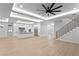 Open concept living room flows into a gourmet kitchen and features recessed lights and wood floors at 3815 W Obispo St, Tampa, FL 33629