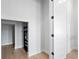 Functional storage room with an open closet area and a door to an additional storage space, ideal for organization at 3815 W Obispo St, Tampa, FL 33629
