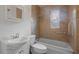 Bathroom featuring tile accents, tub with shower head, and vanity sink at 4424 19Th N St, St Petersburg, FL 33714