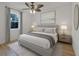 Comfortable bedroom with a ceiling fan, soft lighting, and neutral tones creates a relaxing atmosphere at 4424 19Th N St, St Petersburg, FL 33714