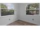 Bright bedroom featuring modern flooring and large windows providing ample natural light at 4424 19Th N St, St Petersburg, FL 33714