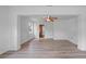 Well-lit living room with modern floors and an open layout at 4424 19Th N St, St Petersburg, FL 33714