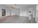 Spacious living room featuring modern floors and a contemporary ceiling fan fixture at 4424 19Th N St, St Petersburg, FL 33714