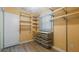 Walk-in closet with adjustable shelving, drawers and window to let in light at 4424 19Th N St, St Petersburg, FL 33714