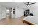 Well-lit bedroom with wood floor features ample closet space and contemporary design elements at 4702 W Heron Ln, Tampa, FL 33629