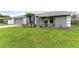 Suburban home with a neatly manicured lawn and fresh plantings at 4714 Kemble Ct, Tampa, FL 33624