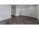 Empty living room with new floors, ready for personalization and comfortable living at 4714 Kemble Ct, Tampa, FL 33624