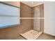 Bathroom featuring a modern glass shower with sleek fixtures and tiled walls at 5351 Lookout Pass, Wesley Chapel, FL 33544