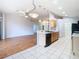 Kitchen with breakfast bar, tile flooring, and view to the living room at 5351 Lookout Pass, Wesley Chapel, FL 33544