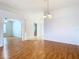 Bright living area features hardwood floors and open layout at 5351 Lookout Pass, Wesley Chapel, FL 33544