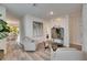 Bright living room featuring stylish furniture, modern decor, and an open layout with hardwood floors at 5647 Del Coronado Dr, Apollo Beach, FL 33572