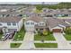 Aerial shot of a beautiful home showcasing the well-maintained front yard at 6228 Dutton Dr, Wesley Chapel, FL 33545