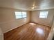 Cozy bedroom with hardwood floors and ample natural light at 6926 Echo Lake Dr, New Port Richey, FL 34653