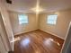 Well-lit bedroom featuring a large closet, ensuring ample space for storage at 6926 Echo Lake Dr, New Port Richey, FL 34653