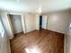 Comfortable bedroom with a large closet and natural light, ideal for relaxation at 6926 Echo Lake Dr, New Port Richey, FL 34653