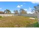 Expansive backyard featuring a full-privacy fence, perfect for outdoor activities and relaxation at 707 Fern Leaf Dr, Ruskin, FL 33570