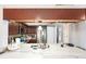 Close-up of the kitchen countertop, stainless steel appliances, and dark wood cabinets at 799 Fairwood Ln, Clearwater, FL 33759