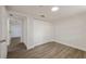 Bedroom offers new laminate floors and a large closet for storage at 8319 N 14Th St, Tampa, FL 33604