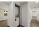 Laundry closet features a stackable washer and dryer at 8319 N 14Th St, Tampa, FL 33604