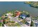 Waterfront homes showcase stunning views of the lake and surrounding properties at 1214 Stover Ct, Holiday, FL 34691