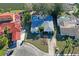 Charming single-story home featuring a spacious front yard, a backyard pool, and waterfront views at 1214 Stover Ct, Holiday, FL 34691