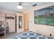 Bedroom featuring shelving and sports memorabilia at 1214 Stover Ct, Holiday, FL 34691