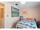 Bedroom featuring sports memorabilia and comfortable furnishings at 1214 Stover Ct, Holiday, FL 34691