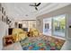 Open-concept space with bright living area and a seamless transition to the outdoor pool area at 10218 Garden Alcove Dr, Tampa, FL 33647