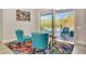 Comfortable seating area with sliding glass doors that lead to the screened in pool and patio at 10218 Garden Alcove Dr, Tampa, FL 33647