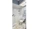 Bathroom with a walk-in tub and white subway tile walls plus bright natural lighting at 1102 Old Mill Pond Rd, Palm Harbor, FL 34683