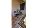 Charming front patio with table and chairs, perfect for enjoying the outdoors at 1102 Old Mill Pond Rd, Palm Harbor, FL 34683