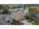 Aerial view of a neighborhood showcasing backyard pools, landscaping, and overall community layout at 1220 Emerald Hill Way, Valrico, FL 33594