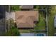 Aerial view of house showing the roof and backyard with privacy fence at 1220 Emerald Hill Way, Valrico, FL 33594