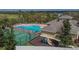 Aerial view of community center amenities including a pool, playground, and basketball court at 1220 Emerald Hill Way, Valrico, FL 33594