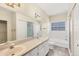 Bathroom featuring double sinks, tub and shower combo at 12227 Noreast Lake Dr, Tampa, FL 33612