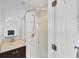 Bathroom with a corner shower and modern vanity at 12227 Noreast Lake Dr, Tampa, FL 33612
