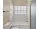 Bathroom with a tub and shower combo and neutral finishes at 12227 Noreast Lake Dr, Tampa, FL 33612